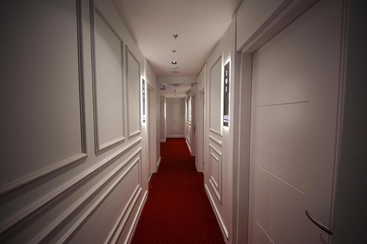 Axu Airport Hotel Arnavutkoy المظهر الخارجي الصورة A corridor at the hotel
