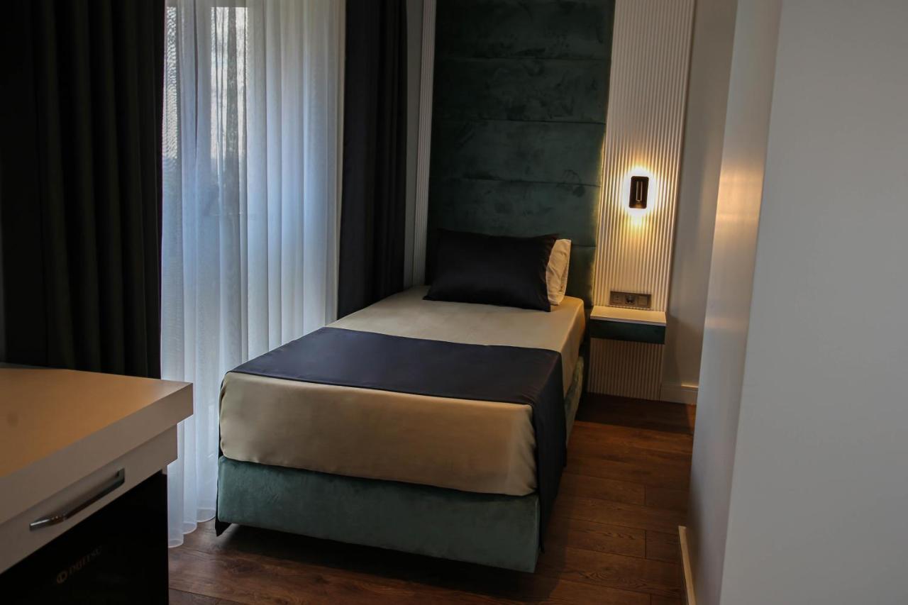 Axu Airport Hotel Arnavutkoy المظهر الخارجي الصورة A single room at the hotel