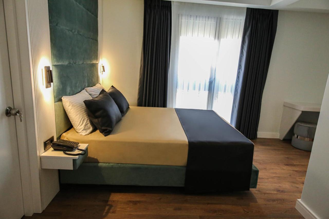 Axu Airport Hotel Arnavutkoy المظهر الخارجي الصورة A bedroom at the hotel